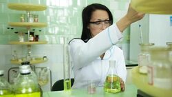 Woman scientist working in a lab Stock Footage