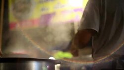 Men cooking as team Stock Footage