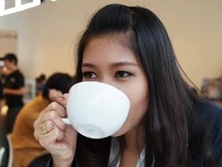 Relaxed business woman drinking Stock Footage