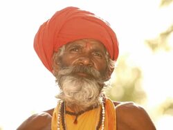 Sage with prayer beads, Faridabad, Haryana, India Stock Footage