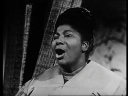 1963 close up Mahalia Jackson singing gospel song Stock Footage