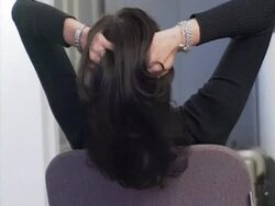 Woman with hands in hair Stock Footage