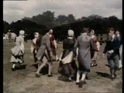 Overview of Wales, traditional dancing, harp player. Wales, 1957 Stock Footage