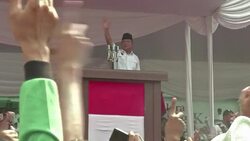 CLEAN - Indonesians face stark choice in pivotal presidential vote News Clip