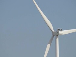 Wind engine generator head close-up with blue sky. Stock Footage