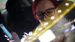 Woman in the car used smartphone Stock Footage