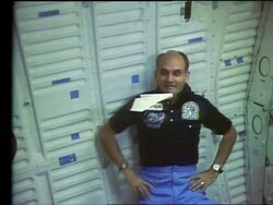 Astronaut Jake Garn playing with paper airplane in Space Shuttle Stock Footage