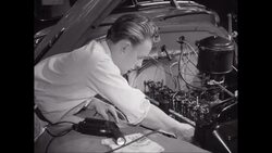 MS Car mechanic repairing car engine / United States Stock Footage