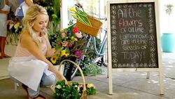 Florist arranging flowers in flower shop Stock Footage