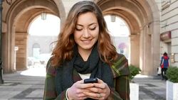 Teen girl texting Stock Footage