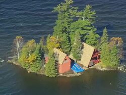 WS ARIEAL View of small island house / Maine, United States Stock Footage