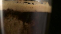 Pouring coffee. Mixing layers Stock Footage