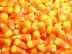 Halloween candy corn rotaing on a plate Stock Footage