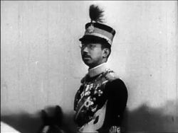 B/W 1940s Emperor Hirohito riding horse + saluting / educational Stock Footage