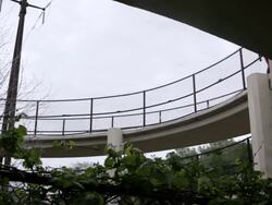 MS  young man running for exercise  on  ramp near train tracks  / Minneapolis, Minnesota, United States Stock Footage
