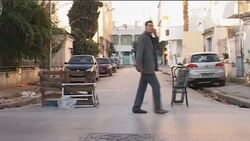 Gunfire in capital, APCs, barricade, vox pops Instructional Video