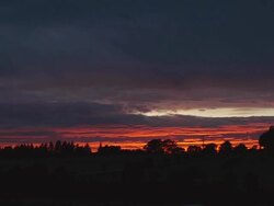 Sunset with moving clouds Stock Footage