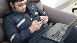 Business man play mobile phone and laptop Stock Footage