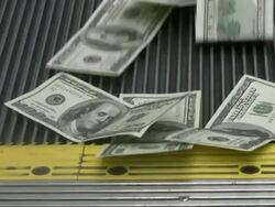Cash money on escalator. Hundred dollar bills & coins. Currency. Stock Footage