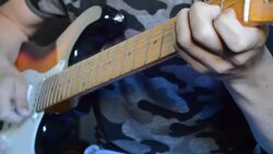 Boy playing guitar close up Stock Footage