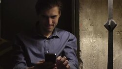 Man Playing Video Game on Mobile Phone Stock Footage