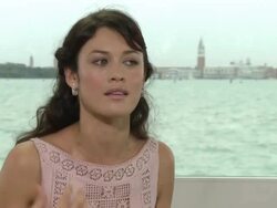 INTERVIEW: Olga Kurylenko on acting for director Terrence Malick at To The Wonder Interviews: 69th Venice Film Festival on September 03, 2012 in Venice, Italy (Footage by WireImage Video/Getty Images) Stock Footage