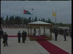 Pope Benedict XVI says he hopes the Catholic church can play a role in the Middle East peace process.   He spoke to reporters briefly before his plane touched down Friday in Amman, Jordan as begins his first Middle East visit. News Clip