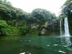 MS Shot of Cheonjeyeon waterfall on jeju island (Natural Monument Heritage) / Seogwipo, Jeju-do, South Korea Stock Footage