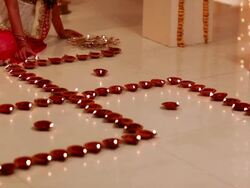 Young woman burning oil lamp in diwali festival  Stock Footage