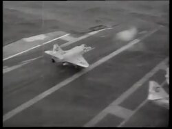 B/W high angle of A4E 'Skyhawk' jet taking off from aircraft carrier / 1960's / Enterprise / Vietnam /SOUND Stock Footage