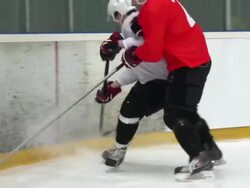 HD:Shot of Two Ice Hockey Players Duelling by the Fence Stock Footage
