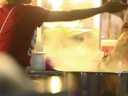 Woman cooking noodle Stock Footage