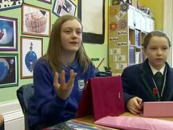 School children use Ipad to learn News Clip