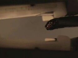 CU Shot of wire loosing protecting layer by wire splitter / Los Angeles, California, United States Stock Footage