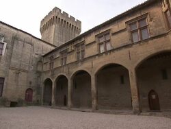 An overcast sky outlines a clock tower at the Nostradamus house in France. Stock Footage