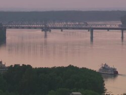 WS Boat moving in Hannibal Mississippi river at sunset / Hannibal, Missouri, United States Stock Footage