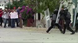 Members of a teachers' union clashed with police in the southern Mexican city of Chilpancingo on Tuesday as part of ongoing unrest over the disappearance and possible massacre of 43 students. (Nov. 11) News Clip
