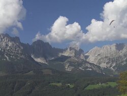 HD Paragliding in Front of Mountain Range Stock Footage