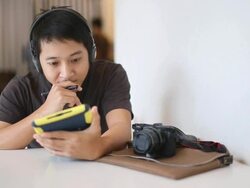 man Thinking with tablet computer in office. Stock Footage