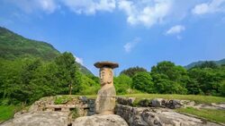 View of standing stone statue(Korea treasure) in Mireukdaewonji(Korea historic place) Stock Footage