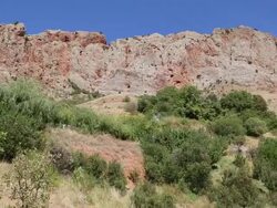 Noravank monastery, red rocky mountains around the complex Stock Footage