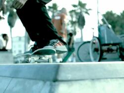 MS SLO MO Shot of skateboard riding on top of ramp and exits in air / Venice, California, United States Stock Footage