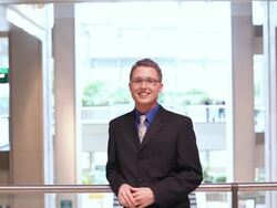  MS Businessman turning from looking over balcony and smiling / Seattle, Washington, United States Stock Footage