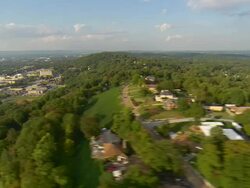 WS AERIAL View of suburban homes on tree covered ridge / Chattanooga, Tennessee, United States Stock Footage