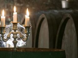 MS Romantic scene in barrel cellar and glass filling by wine / Ayl, Rhineland-Palatinate, Germany Stock Footage