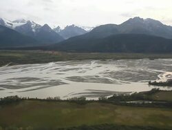 WS AERIAL View of river delta and snow tipped mountains / UlaanBaatar, Mongolia, Mongolia Stock Footage