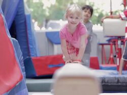  WS Child crawling on balance beam / Vancouver, British Columbia, Canada Stock Footage