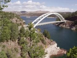 Slow pan from left to right of Cart Creek Bridge at Flaming Gorge in Utah. Stock Footage