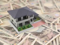Japanese 10000 yen and house Stock Footage