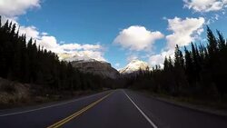 POV vehicle driving on scenic road Stock Footage